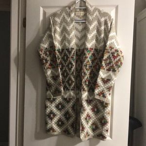 NWOT Sweater/cardigan 55% Cotton. Size is actually a small/medium. Not oversized